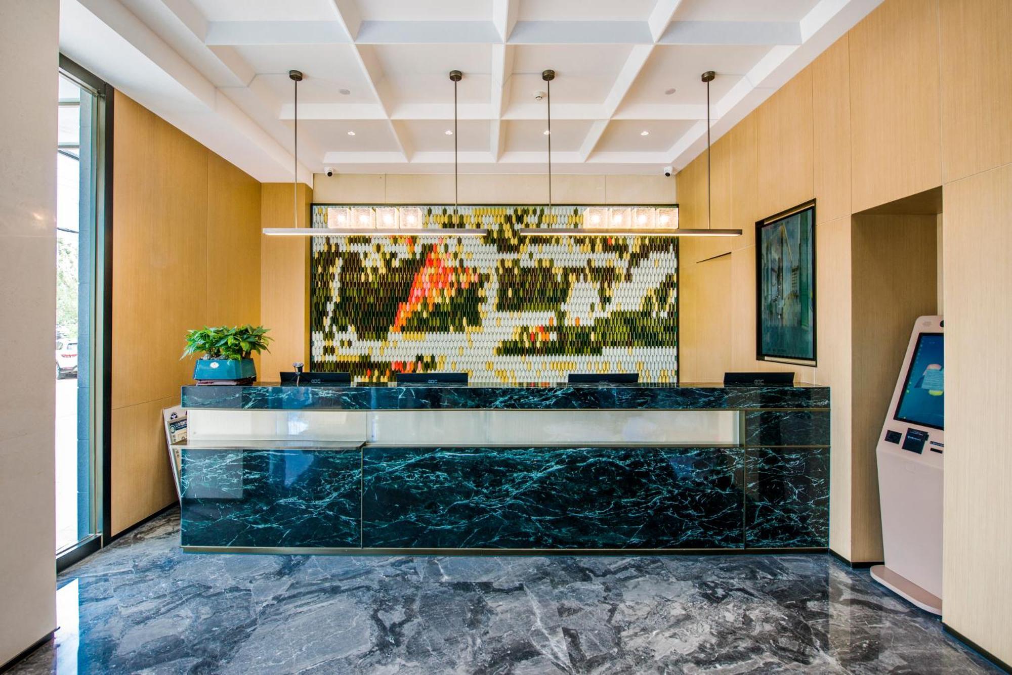 Yiwu Baide Theme Hotel Eksteriør billede