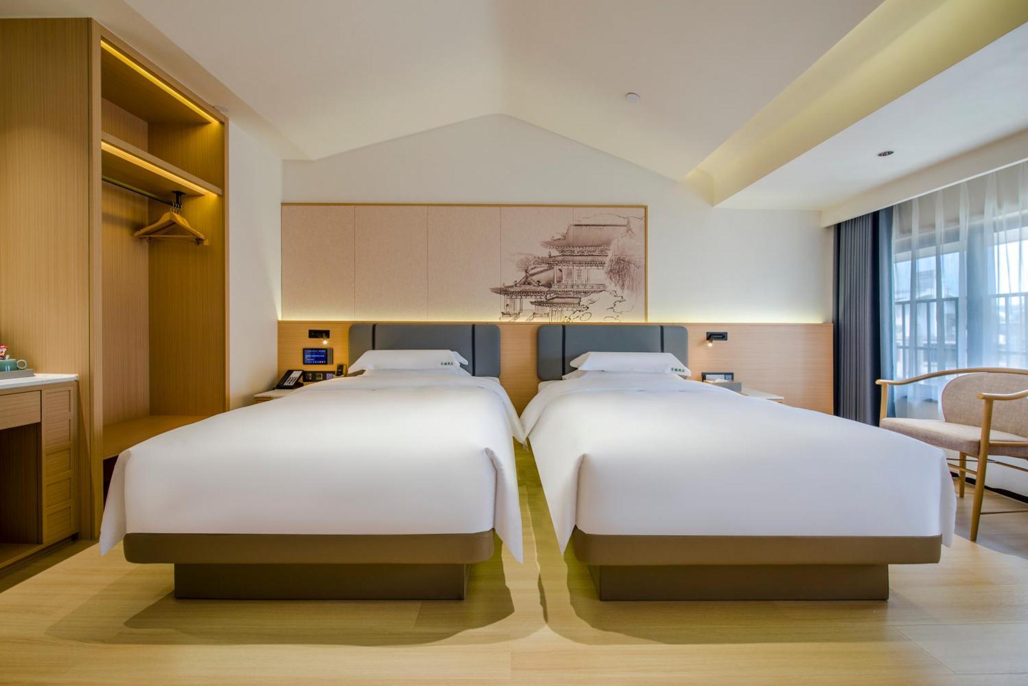 Yiwu Baide Theme Hotel Eksteriør billede