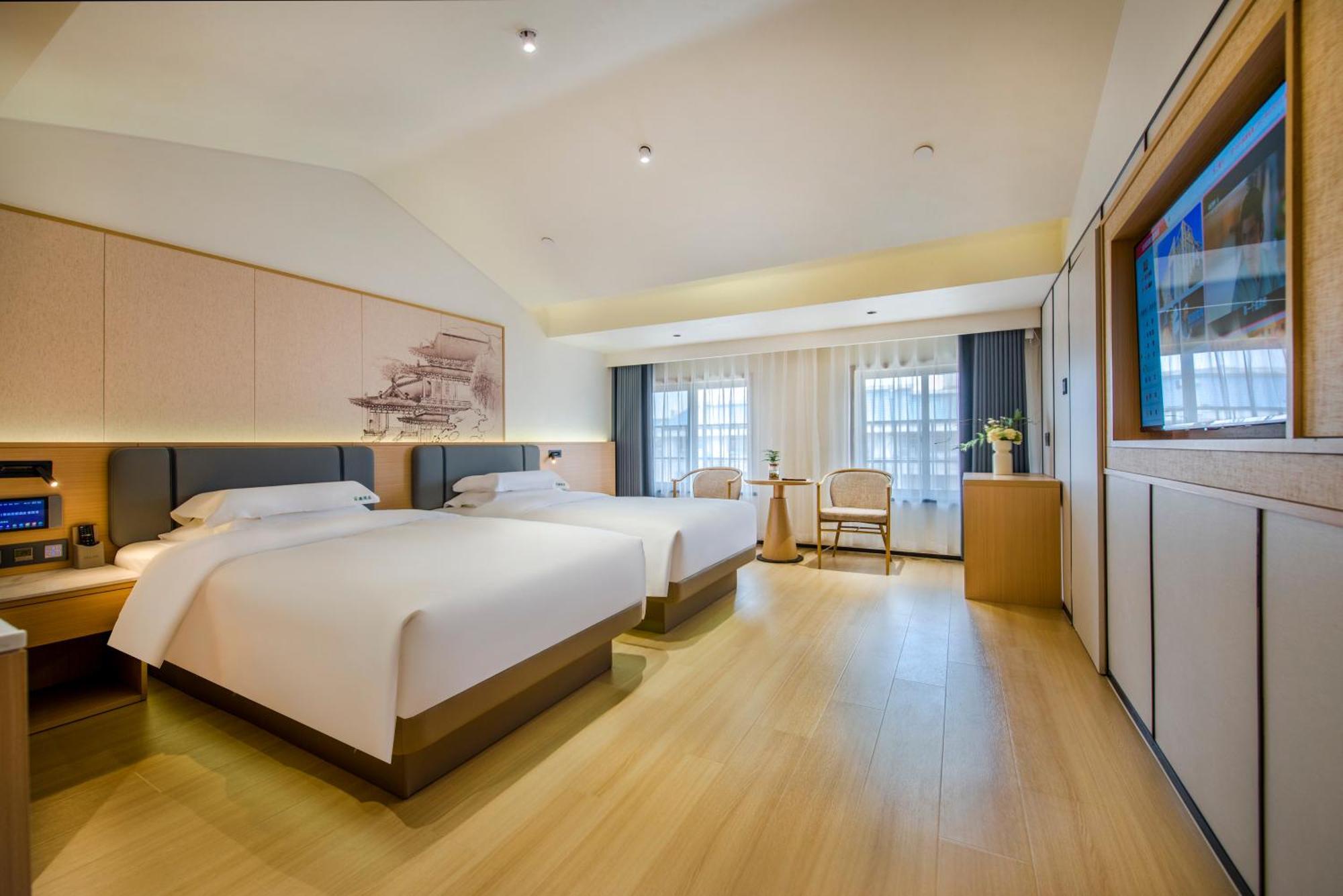 Yiwu Baide Theme Hotel Eksteriør billede