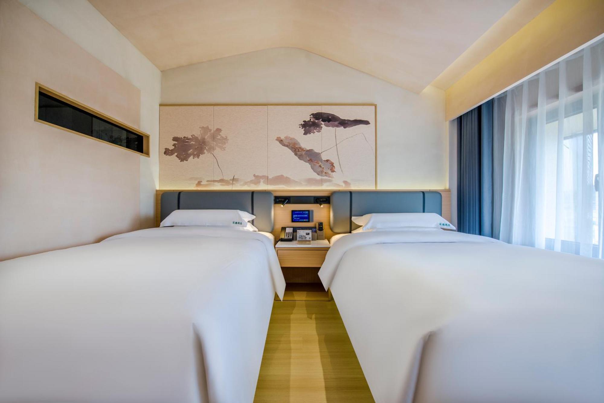 Yiwu Baide Theme Hotel Eksteriør billede